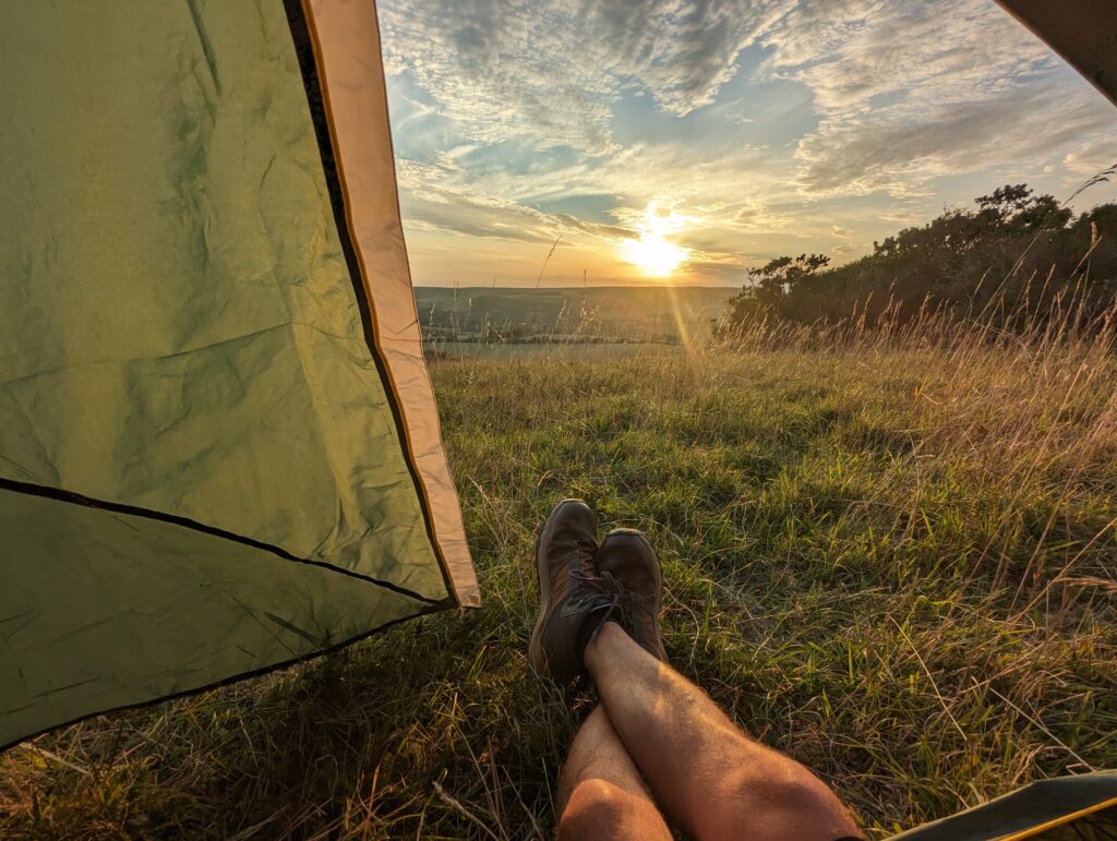 Watching the sunset from inside my tent