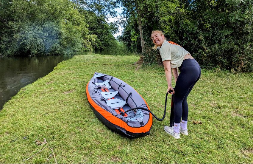 Pumping inflatable kayak